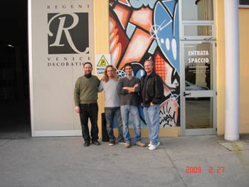 Felipo, Billy, and Mattia pretending to be shorter than Max
